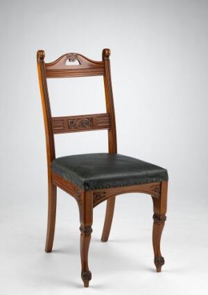  "Spisestuestol" by A. Huseby & Co - a classic dining chair with a polished mahogany frame and dark leather upholstery, featuring turned legs and relief carvings on the backrest.