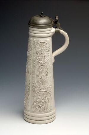  A traditional cylindrical stoneware beer stein known as "Abraham og David" featuring intricate relief decorations with a molded tin lid, crafted by an unknown artist. It displays a pale gray color with a slight gloss from the salt glaze and is set against a gradient background that darkens towards the top.