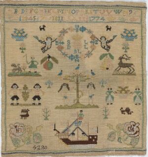  Antique sampler featuring rows of alphabet letters at the top and various motifs including trees, animals, and a central sailing ship on a beige background, with the year "1722" stitched above the ship, indicating the age of the piece.