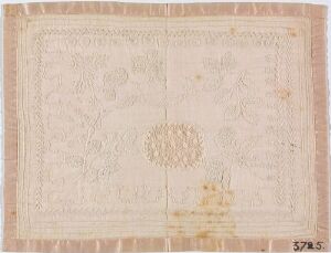  A photo of an antique rectangular textile with a large, faded circular design in the center, surrounded by worn pale stitching of decorative motifs, featuring a numerical notation "3725" in the top-left corner on an off-white fabric background. Artist name and title are unknown.