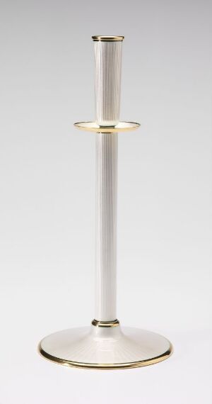  A tall, slim metallic candlestick holder with a shiny silver finish and gold accents on the round base and a decorative ring, set against a soft grey background.