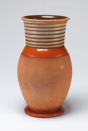  A terracotta ceramic vase with a rounded base and flared neck, decorated with horizontal stripes in off-white and brown near the lip, set against a light gray background.