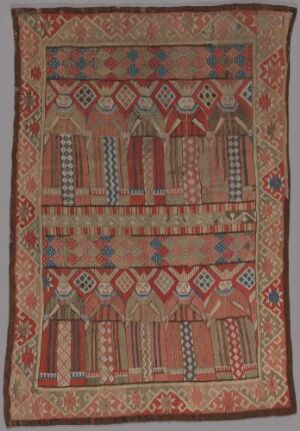  A traditional handwoven tapestry titled "De fem kloke og de fem dårlige jomfruer" by an unidentified female artist; features symmetric geometric and figurative patterns in earthy red, blue, beige, and brown colors, with five vertical panels on the upper and lower sections suggesting the biblical parable of the ten virgins. The border is adorned with intricate repeating geometric shapes.