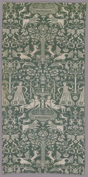  A detailed and symmetrical sage green decorative panel or textile featuring a central tree-like pattern flanked by birds, surrounded by intricate geometric, animal, and floral motifs.