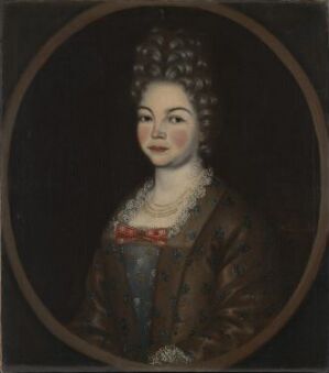 
A traditional oil portrait on canvas titled "Fru sorenskriver Leegaard" by an unidentified artist, showcasing a woman in late 17th to early 18th-century attire, with a detailed brown dress and pearl necklace, set against a dark background within an oval frame.