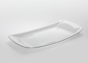  An elegant white ceramic serving platter with a glossy finish and an asymmetrical, leaf-like shape, featured against a gradient background that transitions from white to light gray.