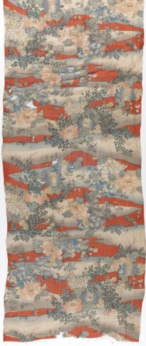  An antique textile with intricate patterns including broad horizontal bands of muted red and detailed motifs that suggest florals, foliage, and small creatures, set against a faded tan background.