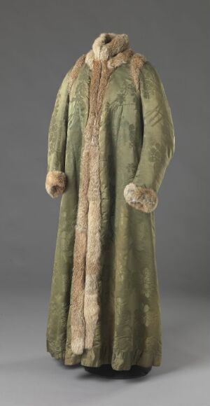  Historical long coat in muted olive green with creamy-white fur trim on the collar and cuffs, displayed against a light grey background. Artistname and title unknown.