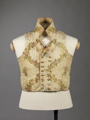  A vintage-style waistcoat with a floral pattern in shades of brown, orange, and green displayed on a mannequin against a gray background. The title and artist of the waistcoat are unknown.