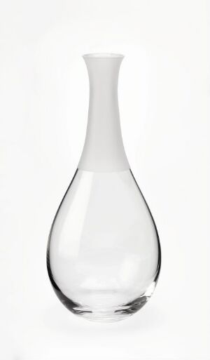 
 An elegant, clear glass carafe by Ingegerd Råman with a matte, etched decoration, showcasing a simple yet sophisticated design against a white background.