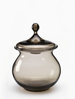  A smoky grey, blown glass container with a lid designed by Richard Duborgh, featuring a light-to-dark gradient and a rounded, elegant shape suitable for storing small items on a table.