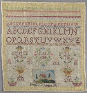  A square sampler with the alphabet and numbers embroidered in muted red, green, yellow, and blue threads on a beige fabric, featuring geometric and floral patterns, with a small landscape scene near the bottom, and dated "Anno 1810".