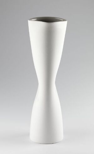  "Pinched Pitcher" by Margit Seland, a white porcelain pitcher with a pinched midsection, glossy finish, and elegant curved design, set against a light gray background.