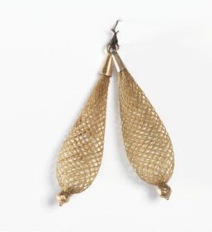  A pair of gold-toned teardrop-shaped earrings with a textured mesh-like surface, displayed against a plain white background.