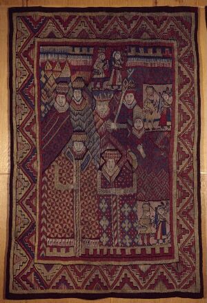  Handwoven tapestry "Kong Salomos visdom" by an unidentified woman artist, displaying a scene of King Solomon holding a sword on his throne, surrounded by figures in a court setting, executed in deep burgundy and indigo hues with geometric border patterns.