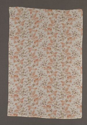  A rectangular off-white textile with a dense pattern of peach-colored flowers and muted green stems and leaves, giving it a delicate, vintage appearance.