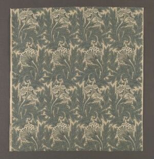  "Tulip" by William Morris, a square textile design showcasing an intricate pattern of cream-colored tulip flowers amid sage and olive green foliage on a dark grey background, executed in machine-woven cotton fabric with a printed pattern.