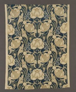  A stylized floral pattern featuring large cream-colored flowers and dark blue or black foliage on a beige background, reminiscent of the Arts and Crafts Movement.