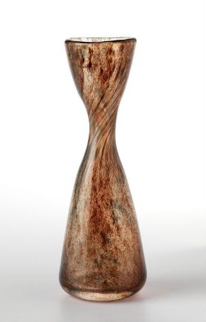  Hand-blown glass vase titled "K-4094" by Arne Jon Jutrem, featuring an hourglass shape with a textured pattern of brown and tan spots and streaks reminiscent of wood grain, set against a translucent background.