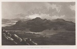  "Utsikt mot nord fra Aavasaksa i midnattssol" by Anders Fredrik Skjöldebrand is a fine art etching on paper displaying a monochromatic landscape featuring rugged foreground terrain and a reflective water body in the valley, with rolling hills and a dynamic cloudy sky, subtly illuminated by the midnight sun.