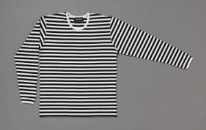  Long-sleeved shirt designed by Annika Rimala titled "Tasaraita," featuring black and white horizontal stripes, machine-knitted from cotton. The shirt has a round neck, full-length sleeves, and is displayed against a grey background.