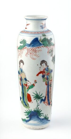  A slender porcelain vase, featuring traditional Asian artwork with two figures in colorful robes surrounded by blue and green foliage patterns, against a white background.