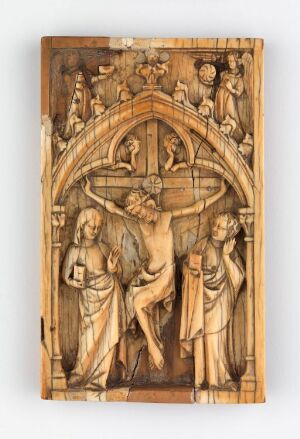  Carved ivory ecclesiastical panel titled "Del av Diptyk" by an unidentified artist, depicting the crucifixion of Jesus Christ with Mary and John at his sides, and a group of angels above, executed in intricate relief with a warm cream hue and delicate textural details.