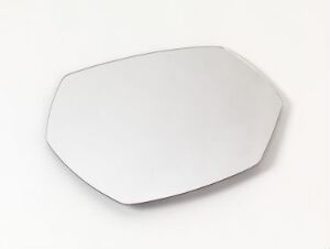  An elegantly designed mirror by Ilkka Suppanen titled "Stone", featuring a plastic body with a reflective surface, shaped like a smooth-edged stone, set against a light background.