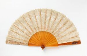  A traditional folding fan with a semi-transparent top featuring subtle beige patterns, an orange lower section, and a light brown wooden frame with unreadable calligraphy on the guard, set against a white background.