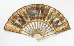  An antique hand fan displayed open, with cream-colored panels accented with golden embellishments, and illustrated scenes framed by ornate golden borders. The metallic ribs of the fan radiate from a decorative pivot point that acts as the handle.