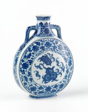  A blue and white porcelain vase with a flattened oval shape, featuring a central white medallion with blue floral designs and intricate blue patterns over the rest of the surface, with twisted rope-like handles on the sides of the narrow neck.