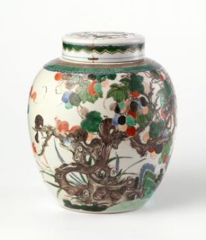  A traditional porcelain ginger jar, rounded with a tapered neck, adorned with a colorful and intricate botanical design of branches, leaves, and flowers in green, red, orange, purple, and pink against a white background.