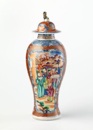  An ornate porcelain vase with a lid, featuring detailed, multicolored illustrations with figures in traditional robes, set against a background of blues and oranges, accented with gold. The intricate patterns and a bustling scene suggest an East Asian influence and exquisite craftsmanship.