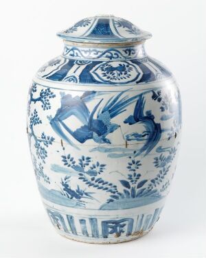  A traditional blue and white Chinese porcelain vase with a cylindrical body, decorated with botanical motifs and geometric patterns. The neck tapers into a narrower form before flaring out at the rim, complemented by a matching lidded top.