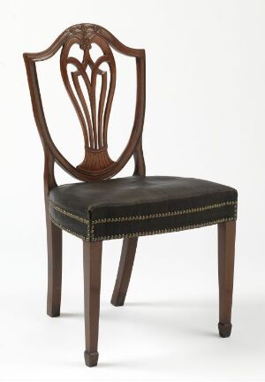  A polished dark brown wooden chair with a heart-like ornamental back pattern and a black upholstered seat secured with brass nailhead trim.