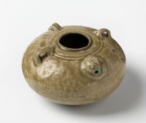  An ancient spherical ceramic vessel with a wide spout and two small loop handles on a black background, featuring a marbled beige and grey surface with signs of wear.