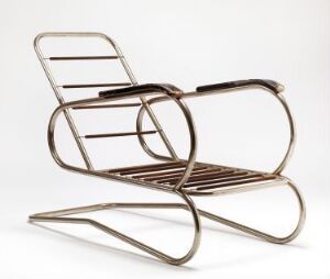  "Nr. 39 (variant av)" by Josef Kussius, an artfully designed chair made of steel tubing with wooden fixtures and a welding technique, showcasing a continuous looped base and curved armrests in a bronze-silver finish on a white background.