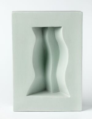  "Optica" by Elisabeth von Krogh, a decorative ceramic object featuring a pale green, matte surface with two mirrored, wavy vertical forms resembling hourglasses within a flat rectangular frame, showcasing a sense of depth and motion within a minimalistic design.