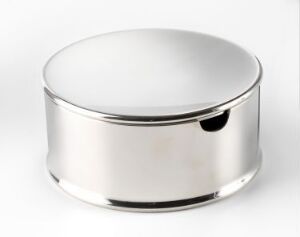  A polished silver cylindrical container with a reflective surface, set against a pure white background, possibly used for cosmetics or small items storage.