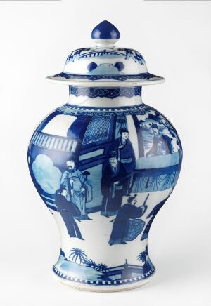  A traditional blue and white porcelain vase with a lid, featuring intricate painted scenes of figures and stylized patterns.