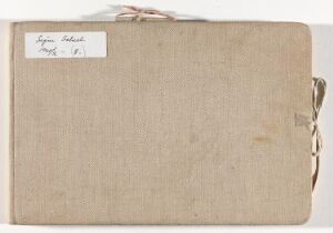  A beige-colored artist's sketchbook titled "Skissebok" with a twine closure and a handwritten label, conveying a sense of vintage artistic use.