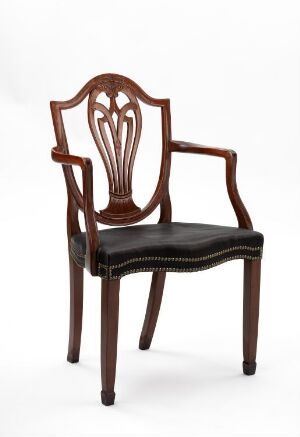  An elegant dark brown wooden armchair with a lyre-shaped backrest and a black upholstered seat, set against a plain white background.