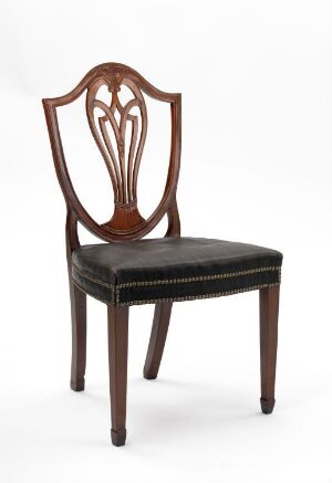  An elegant medium-brown wooden chair with sleek tapered legs and a high backrest, featuring symmetrical oval cut-outs and a black upholstered seat secured with decorative trim.