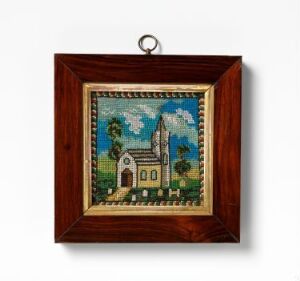  An oil painting of a quaint church with a tall steeple, set against a bright blue sky with clouds, surrounded by lush greenery and colorful flowers, encased in a simple square wooden frame.