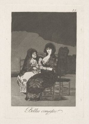  A grayscale etching titled "Pretty teachings" by Francisco de Goya, depicting two women in elaborate traditional attire sitting closely together, engaged in a seemingly intimate conversation against a dark, undefined background, with fine details suggesting textures of lace and patterned fabrics on their clothing.