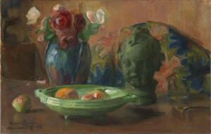  "Still Life" by Harriet Backer is a painting on canvas displaying a blue vase with red and white flowers, a partially visible dark green sculpture with leaf patterns, and a collection of apples and citrus fruits on a green plate, set against a subdued background.