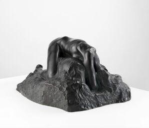  Bronze sculpture "Danaïd" by Auguste Rodin featuring the torso of a female figure in a forward arched pose with intricate detailing on a plain white background.