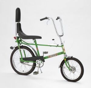  The "Tomahawk" bicycle, designed by an unidentified artist, features a bright green frame with colorful patterned decals, smaller front wheel, high-backed black seat, and chrome U-shaped handlebars, embodying a modern take on traditional bicycle design with a bold aesthetic.