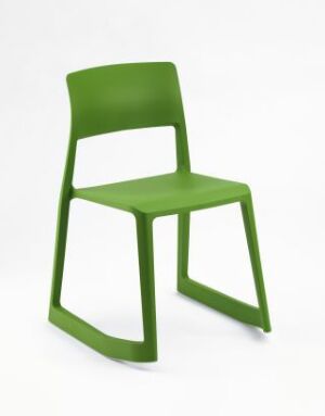  The "Tip Ton" chair by Barber & Osgerby, a modern, green polypropylene chair with a forward-tilting seat and slanted legs, set against a white background.