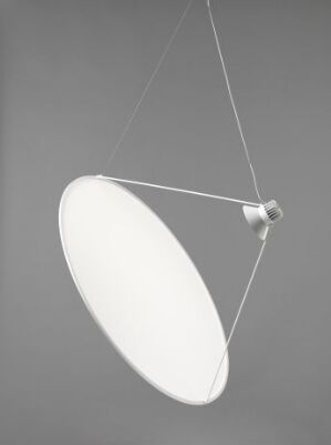  The "Amisol" lamp, a design by Daniel Rybakken, featuring a large, translucent white disc diffuser suspended by two thin wires from a metallic light source against a gray background.